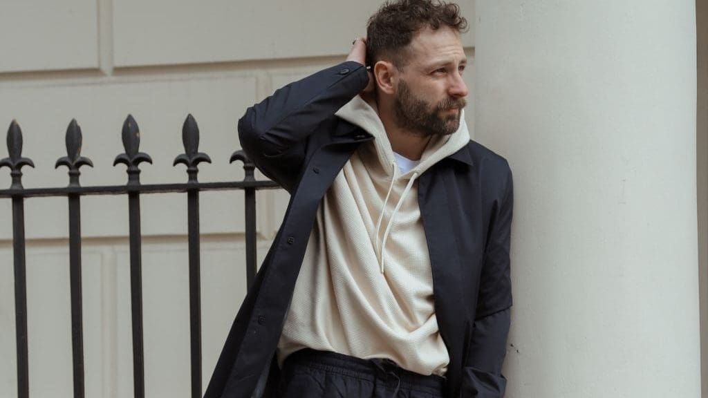 man in jacket with hoodie